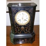 A 19th Century French Ebonised Boulle Brass Inlaid Mantel Clock; the white enamel dial with Roman