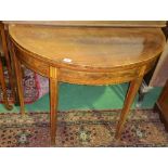 A Regency Mahogany and Inlaid Half Moon Table, having boxwood inlay and standing on square