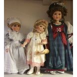 Three Porcelain Dolls.