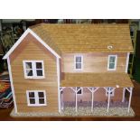 A Large Scratch Built Two Storey Doll's House; wired for electricity. 98 cm wide. (Electrics need to