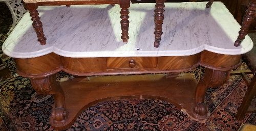 A 19th Century Satin Mahogany Washstand, having a shaped grey marble top.