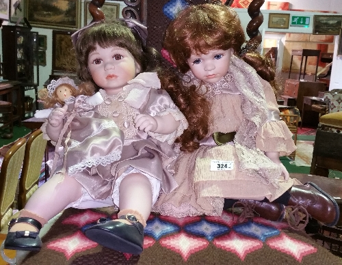 Two Porcelain Dolls.