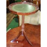 A 20th Century Leather Topped Tripod Table.