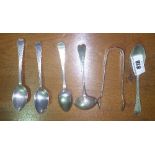 A Small Georgian Silver Sauce Ladle along with a Silver Tongs; along with a set of bright cut