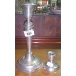 A Silver Hallmarked Candlestick together with a smaller silver hallmarked candlestick. 449g (2).