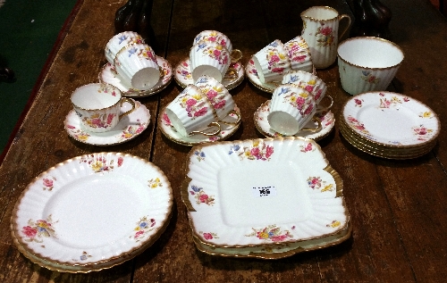 A Victorian Floral Part Tea Set with 11 cups and saucers, 5 plates, 2 cake plates, milk & sugar