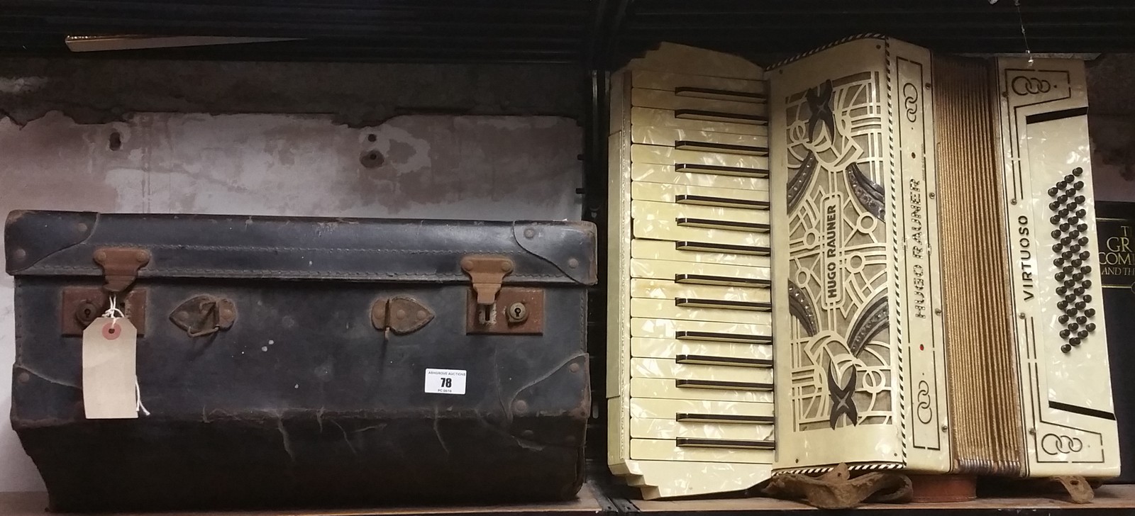 A Vintage Hugo Rauner Virtuoso Piano Accordion; in a cream pearline case.
