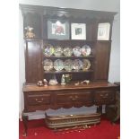 A Very Good 19th Century Oak Welsh Dresser, with triple drawer freeze on cabriole legs.