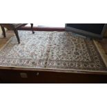 A Green Ground Kashmir Rug, having an all over design size. 6' x 4'.