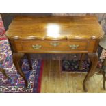 A Georgian Style Mahogany Rectangular Top Foldover Supper Table; with one long drawer to the frieze,