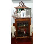 A Late 19th Century Cabinet with mirrored gallery, single drawer over glazed door.