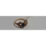A Gold Sapphire and Diamond Ring, stamped 18ct.