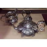 A Quantity of Silver Plated Tea wares with Highly Engraved Exterior.