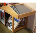 A Contemporary Oak Framed Display Cabinet, with opposing lift-up sections.