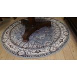 A Chinese Circular Rug.