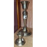 A Silver Hallmarked Candlestick together with a smaller silver hallmarked candlestick. 449g (2).