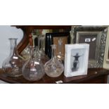 Five Decanters/Carafes along with Four Photo Frames.