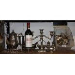 A Box Lot of Silver Plate, to include a three branch candlestick, toast rack, Newbridge bottle