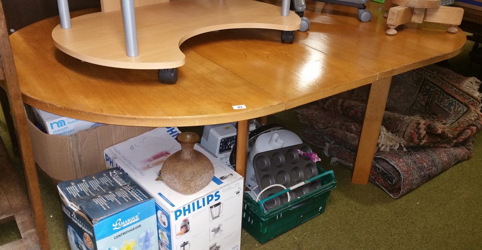 A 20th Century Extending Dining Table with Two Extra Leaves.