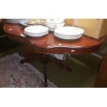 A Good Continental Walnut and Inlaid Centre Table, the profusely inlaid shaped top on a highly