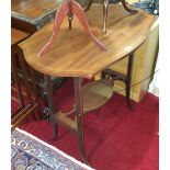 An Edwardian Mahogany and Inlaid Serpentine Shaped Centre Table.