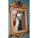 A George Third Style Cream and Gilt Framed Wall Mirror; 36" high x 21" wide.