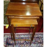 An Early 20th Century Mahogany and Inlaid Nest of Three Tables.