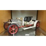 A Vintage Model of an Early 20th Century Motor Car.