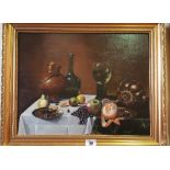 A Still Life Oil on Board by Ipsall; a table setting with fruit, framed