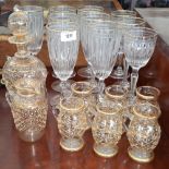 A LOVELY COLLECTION OF GLASSES WITH GILDED RIMS, together with a glass drinks service with gilded
