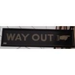 A 'WAY OUT' SIGN.