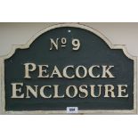 'NO 9 PEACOCK ENCLOSURE' SIGN.