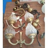 A GROUP OF BRASS WALL LIGHTS, some with Empire Torch frosted glass lamp shades.