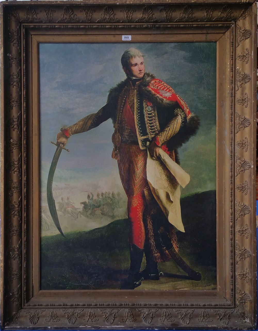 A.T.O. A COLOURED PRINT of a military man in an early 19th century period frame. 41" x 53".