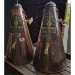 A PAIR OF 19TH CENTURY COPPER FIRE EXTINGUISHERS. (Sir Malcolm's Kitchen).