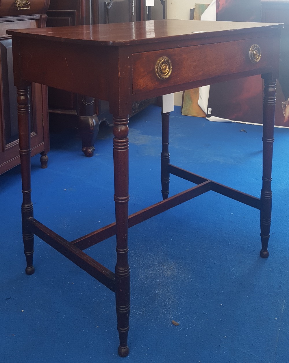 A GEORGIAN MAHOGANY SINGLE DRAWER SIDE TABLE with stretcher base. (Ethan's Bedroom).