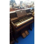 AN EARLY 20TH CENTURY OAK CASED NEEDHAM ORGAN made in New York, U.S.A.