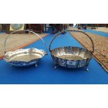 TWO LATE 19TH/EARLY 20TH CENTURY PIERCED PLATED CAKE/BREAD BASKETS with twist handles.