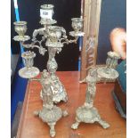 A LOVELY FOUR BRANCH BRASS CANDELABRUM & A PAIR OF WELL CAST FIGURAL CANDLESTICKS.