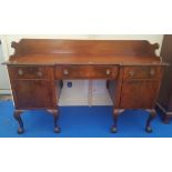 A 19TH CENTURY MAHOGANY INVERTED SIDEBOARD with rope edge moulded top, galley back and ball and claw