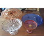 A CRANBERRY TAZZA & THREE GLASS CAKE STANDS.