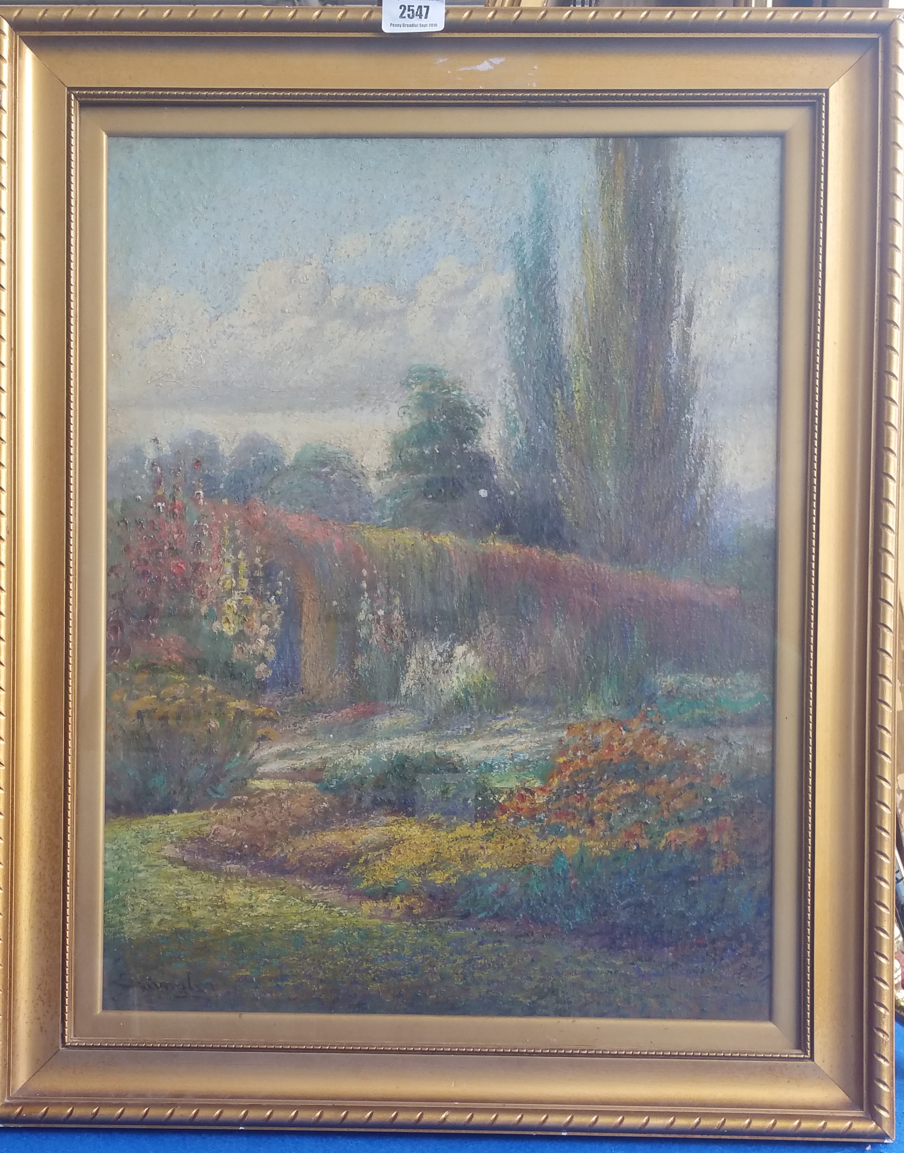 AN EARLY 20TH CENTURY PASTEL of a garden scene in a gilt frame. 22.5" x 27.5".