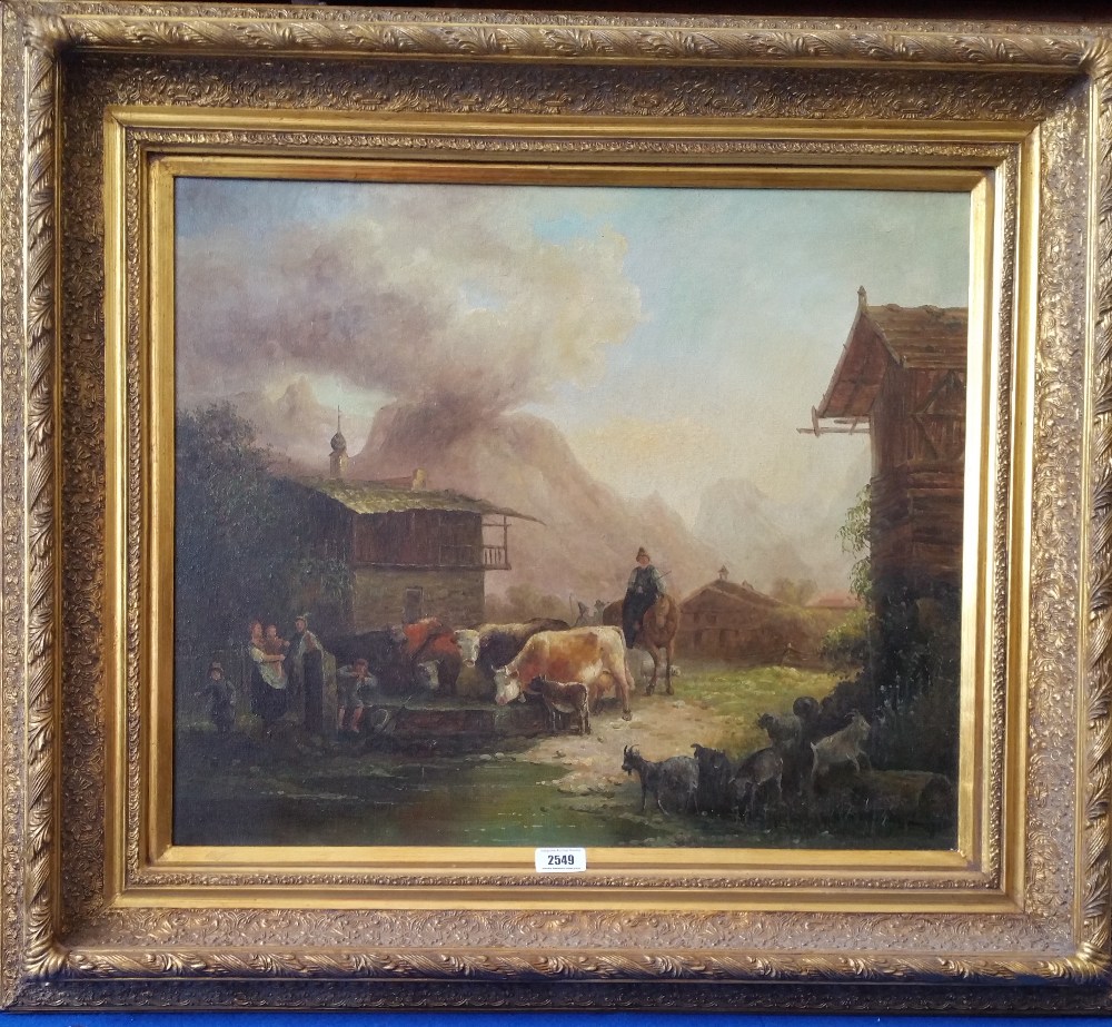 A.T.O. AN OIL ON CANVAS of cattle watering, in an ornate gilt frame. 33" x 29.5".