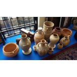 A LARGE QUANTITY OF VINTAGE TERRACOTTA URNS with others and vases etc.