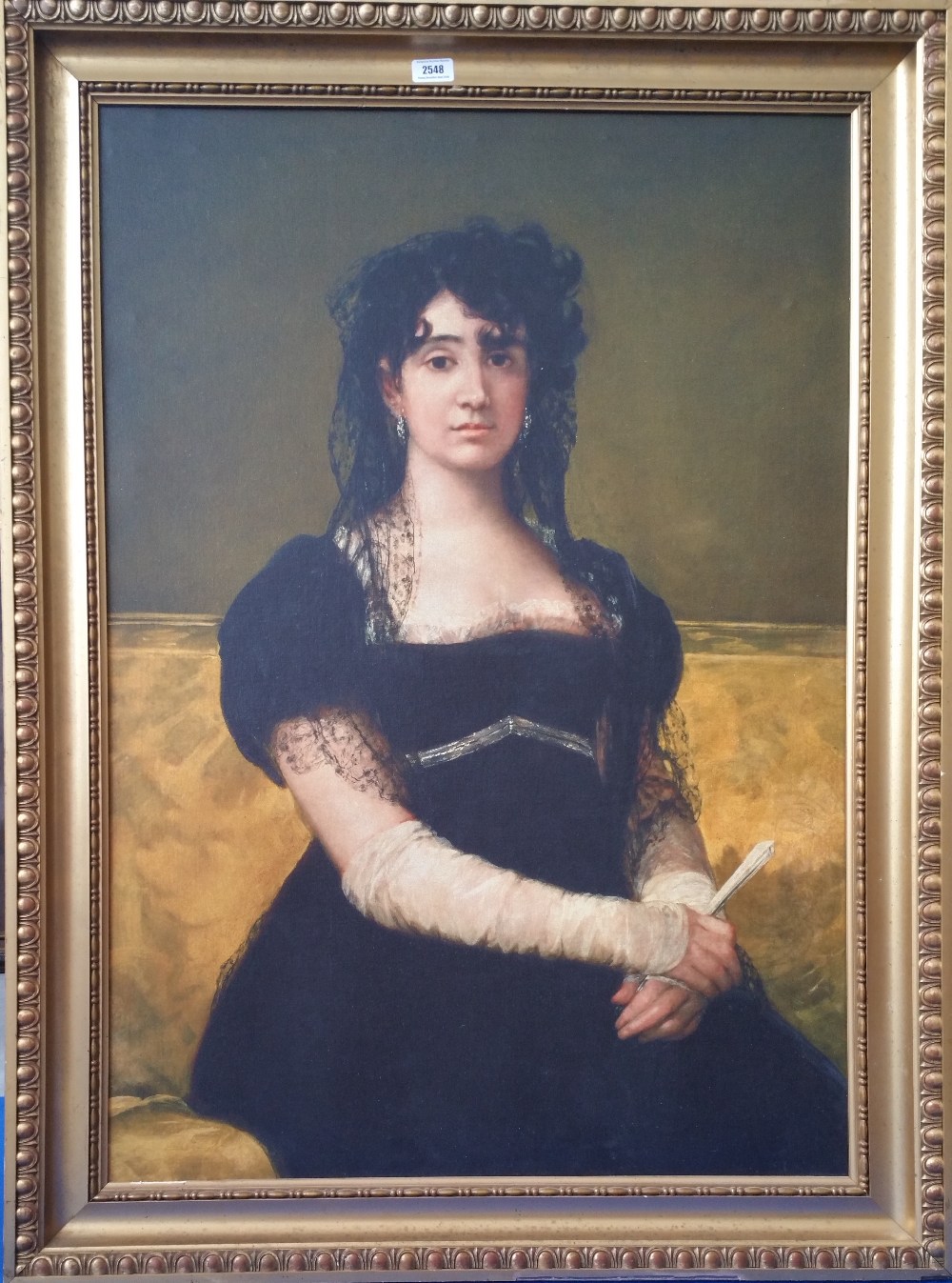 A.T.O. A LARGE COLOURED PRINT of a young Spanish lady, in a gilt frame. 34.5" x 46.5".
