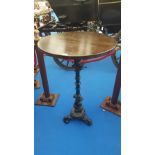 A BAR HIGH TABLE on cast iron decorative tripod base.