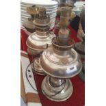 THREE EARLY 20TH CENTURY OIL LAMPS converted.