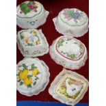 A SET OF SIX FRANKLIN MINT PIE/JELLY MOULDS, brightly decorated with animals and flowers.