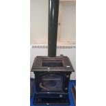 A CAST IRON SOLID FUEL STOVE.
