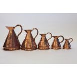 A MAGNIFICENT GRADUATED SET OF FIVE 19TH CENTURY COPPER MEASURES with proof marks. (Sir Malcolm's